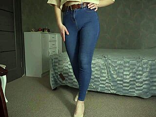 Teasing tight blue jeans with thongs