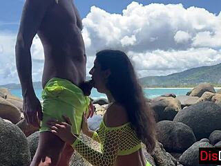 young couple fucking hot on a public beach overlooking the sea